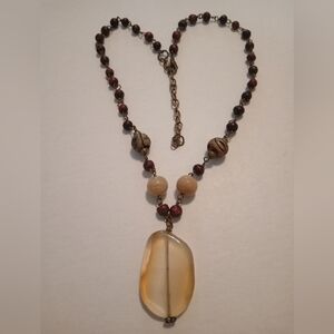 #420.    Natural Stone Pendant And Wood Beaded Necklace. 10" Long